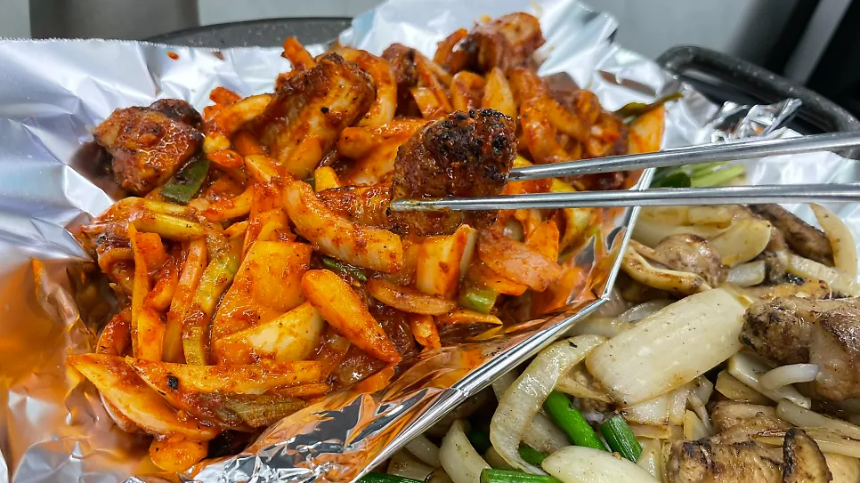 A generous portion of half-and-half grilled hagfish