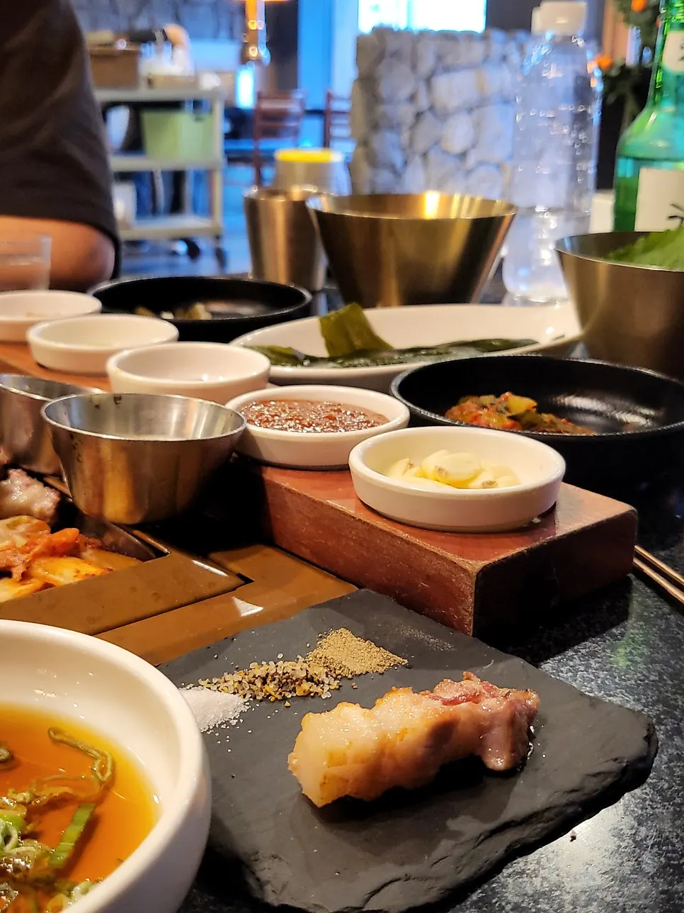 Black pork meal with a variety of sauces
