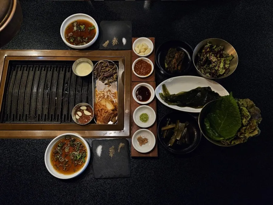 Side dishes pre-set for a reserved table