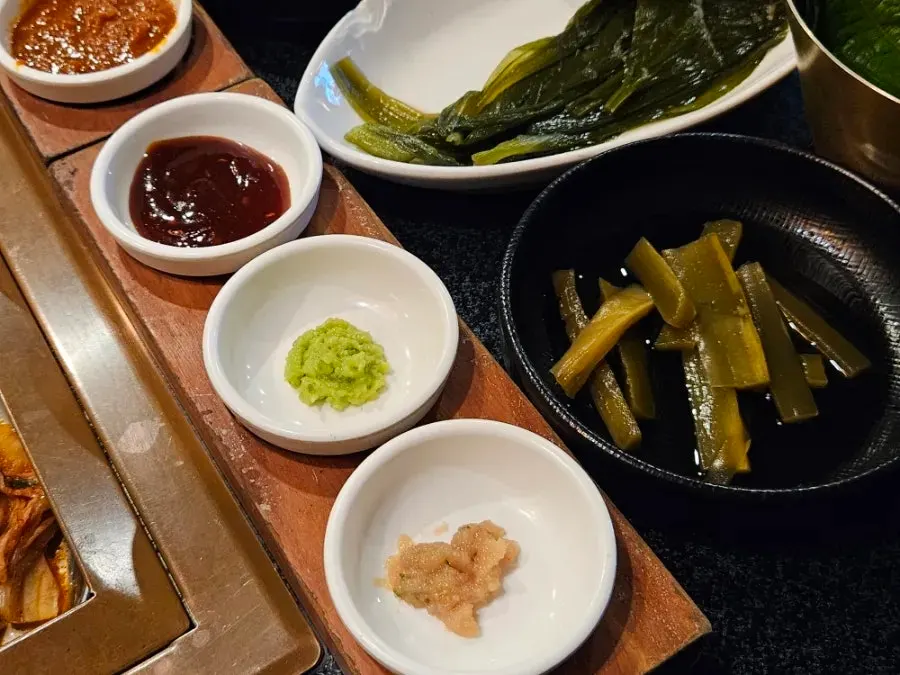 Plate of cream cheese, galchi sokjeot-myeolchi jeot and other sauces