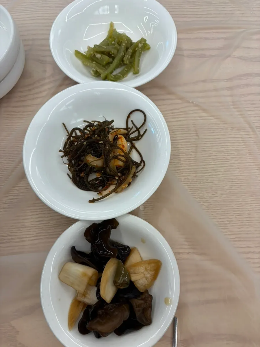 Menu board listing Wando Cham Jeonbokjip's abalone dishes