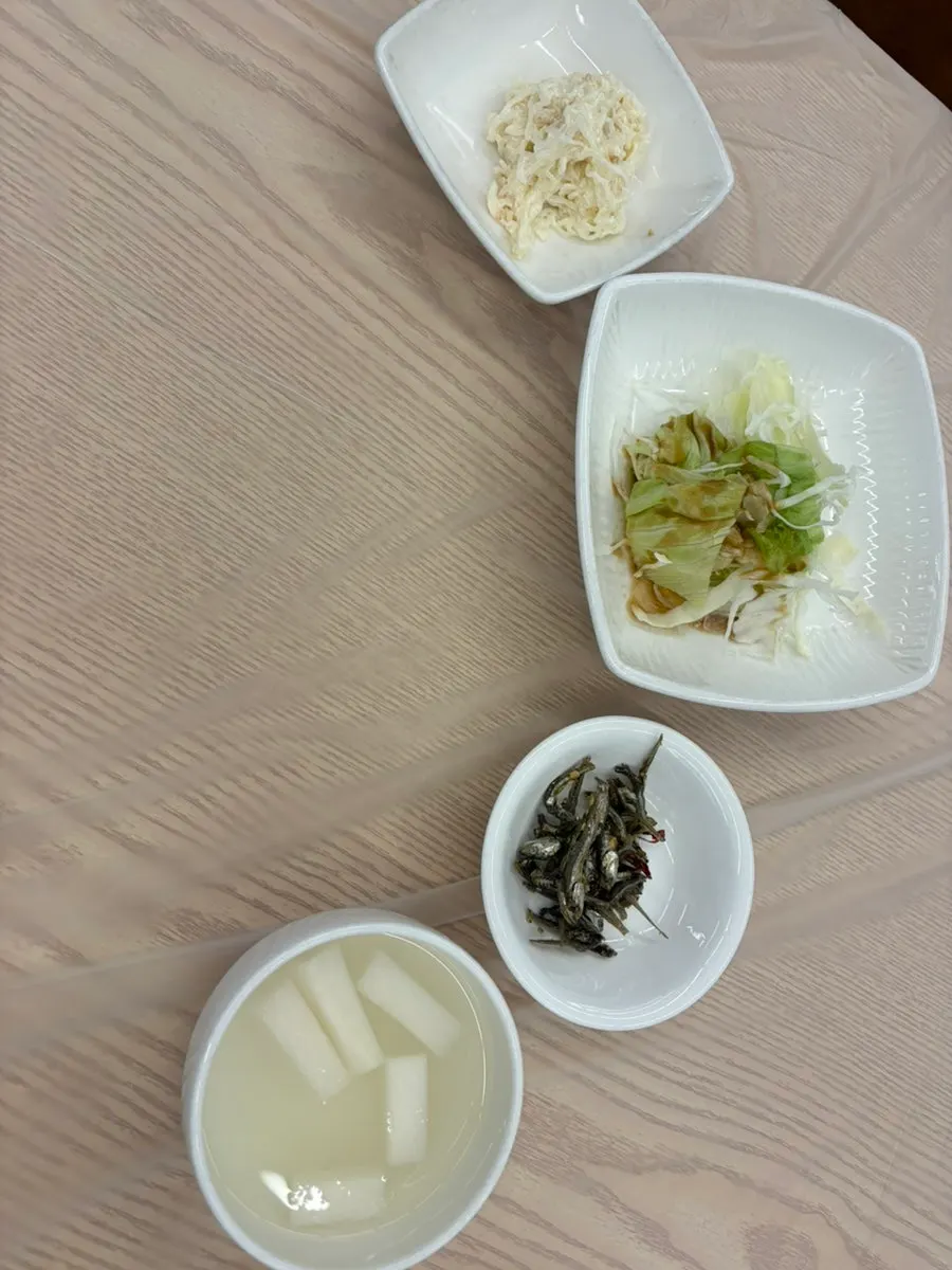 Menu board with jeonbokjuk and course meal listings