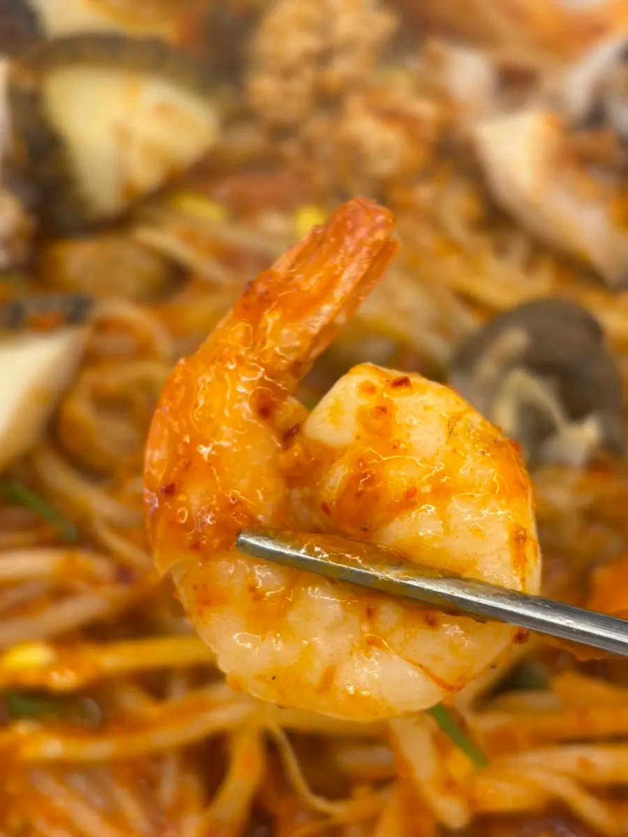 Seafood stew mixed with bean sprouts and other seafood