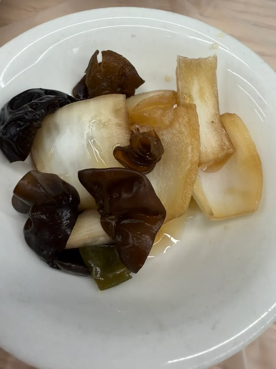 Neatly arranged side dish bowl at Wando Cham Jeonbokjip