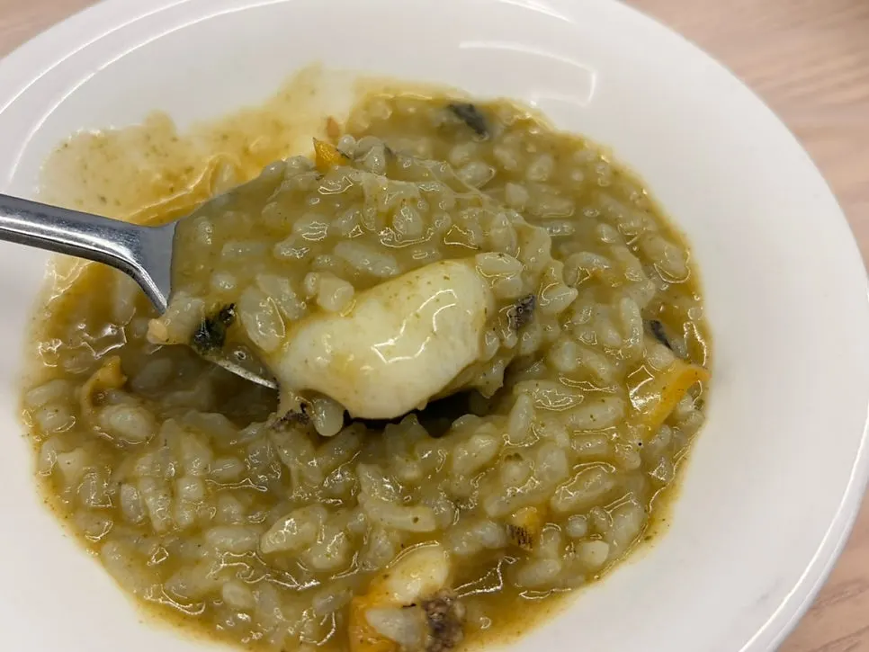 Abalone porridge with visible abalone meat