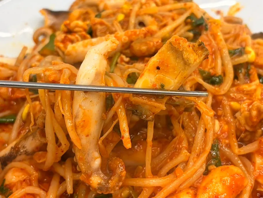 Abalone cut into bite-sized pieces with bean sprouts