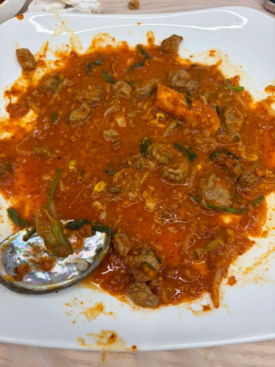Empty plate after finishing the abalone seafood stew