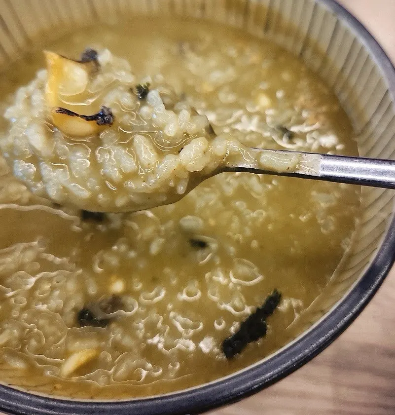 A spoonful of abalone porridge