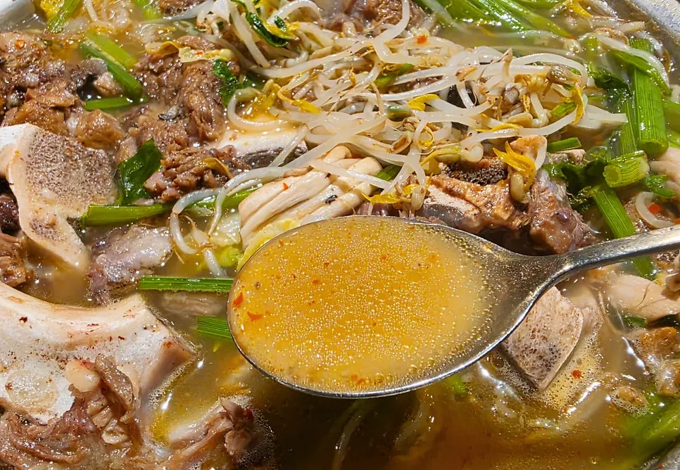 Broth from the beef short-rib hot pot beginning to boil