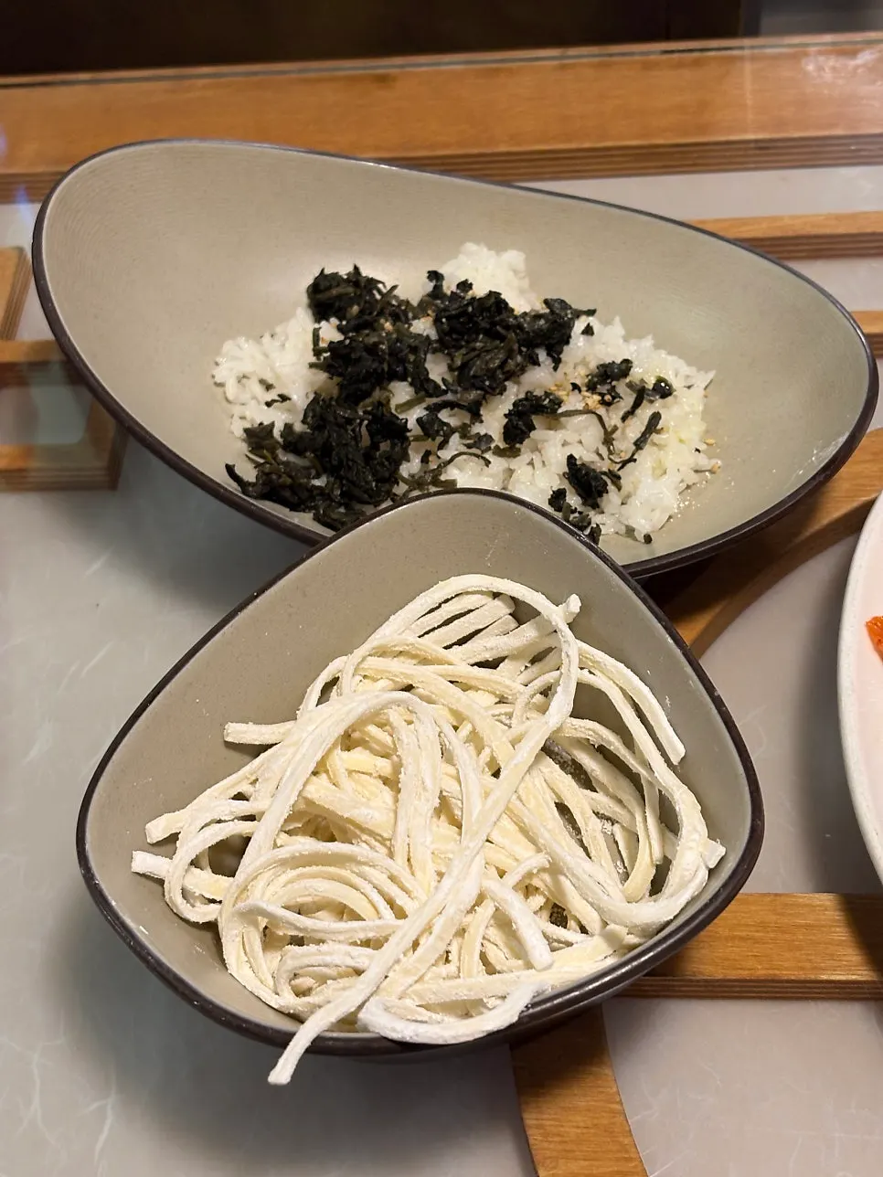 Thin shabu-shabu-style beef served with the beef bone hot pot