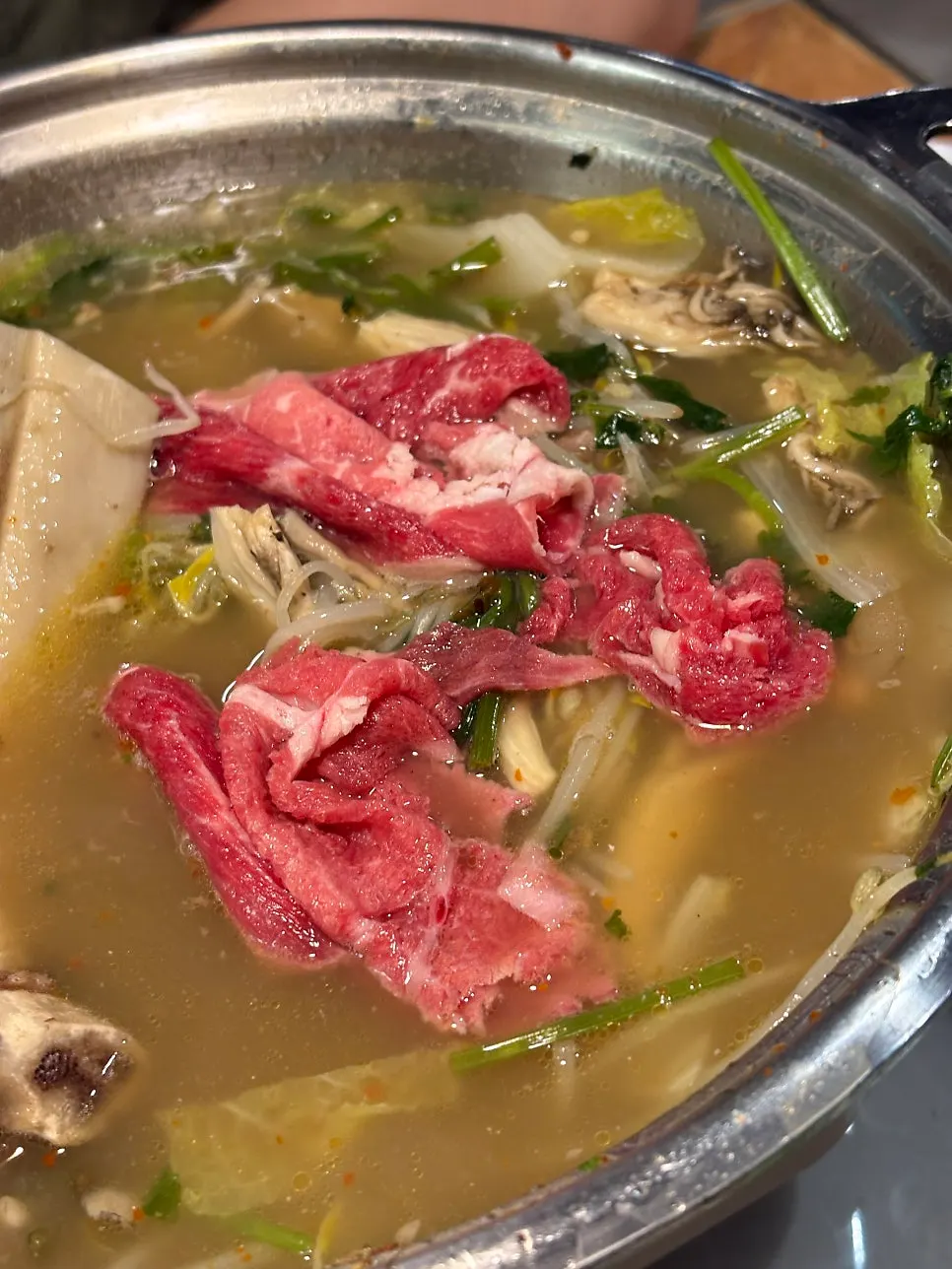 Meat dipped in Hyoeunok's special sauce