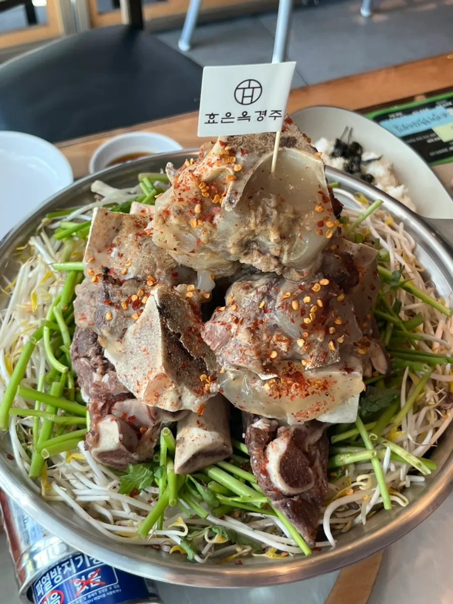 Vertical photo of Hyoeunok's Ppyeoberest mountain of beef bone hot pot