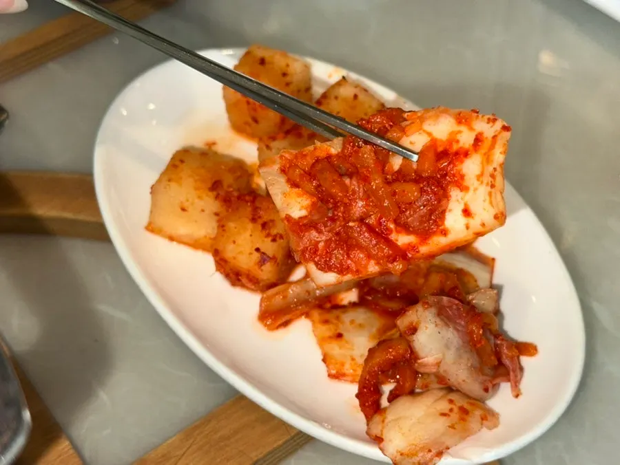 Side dish plate with kimchi and squid jeotgal