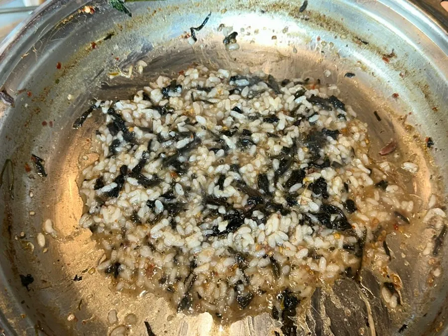 Gondre rice stirred into leftover broth as porridge