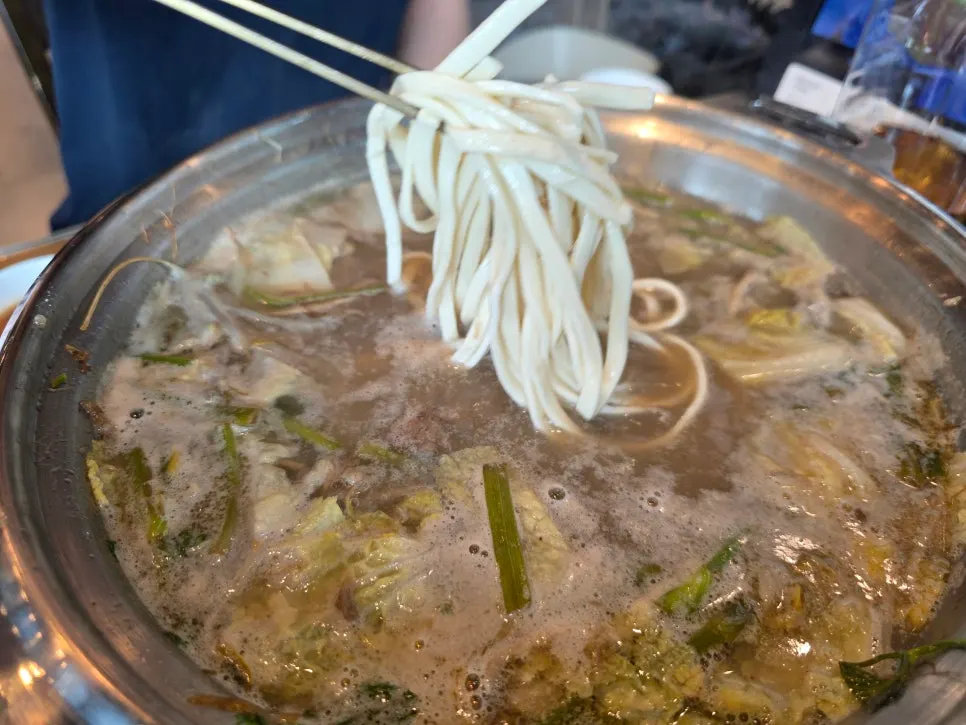 A plate of hot pot meat cooked in the broth