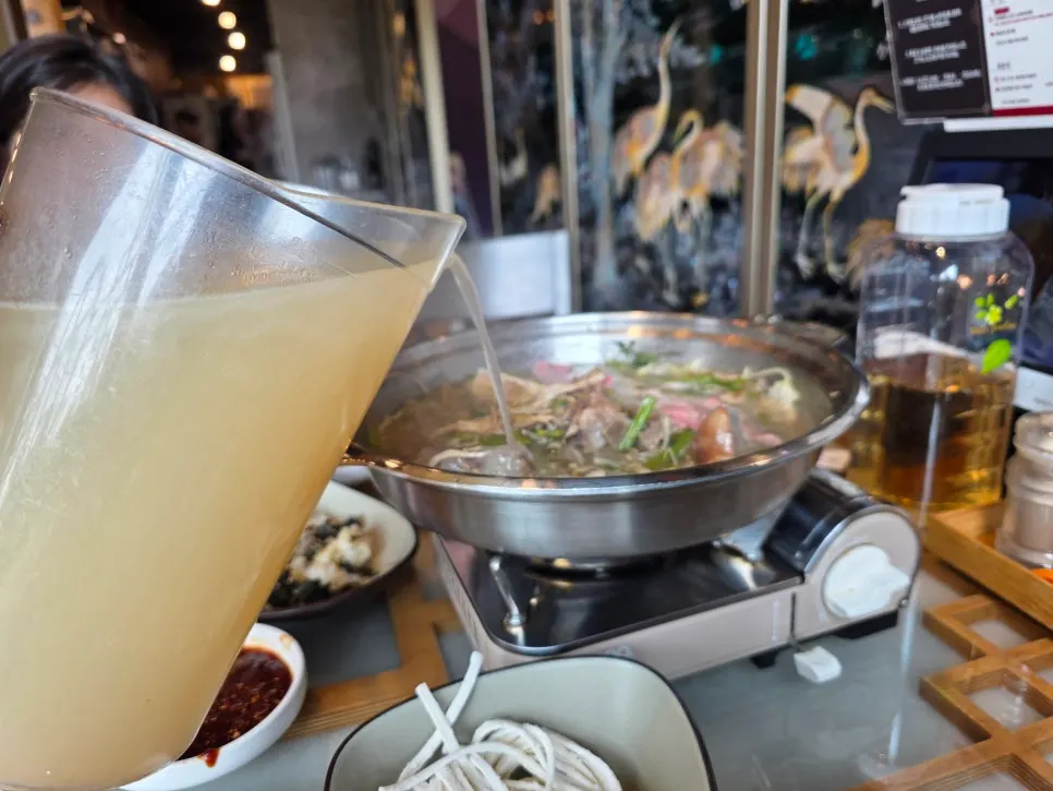 Knife-cut noodles cooked in the rich broth