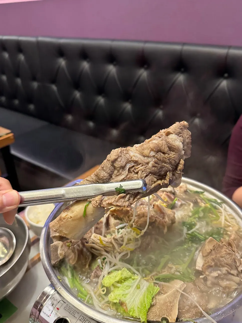 The broth of the Ppyeoberest beef rib hot pot starting to boil