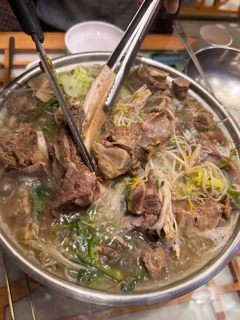 Beef ribs and hot pot broth cooking away