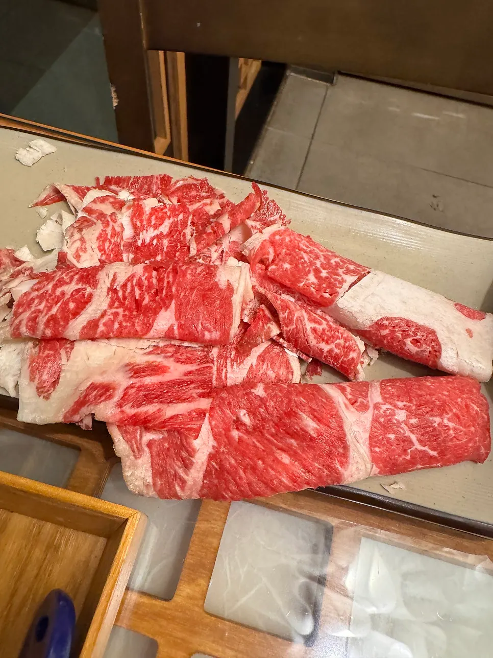 Gyeongju minari, mushrooms, and shabu-shabu beef added to the hot pot