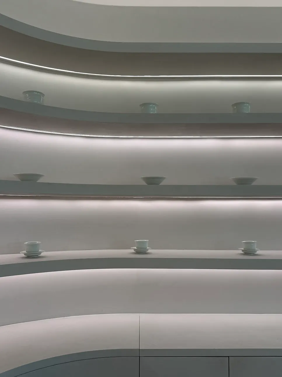 Teacup decor arranged in a corner of the café