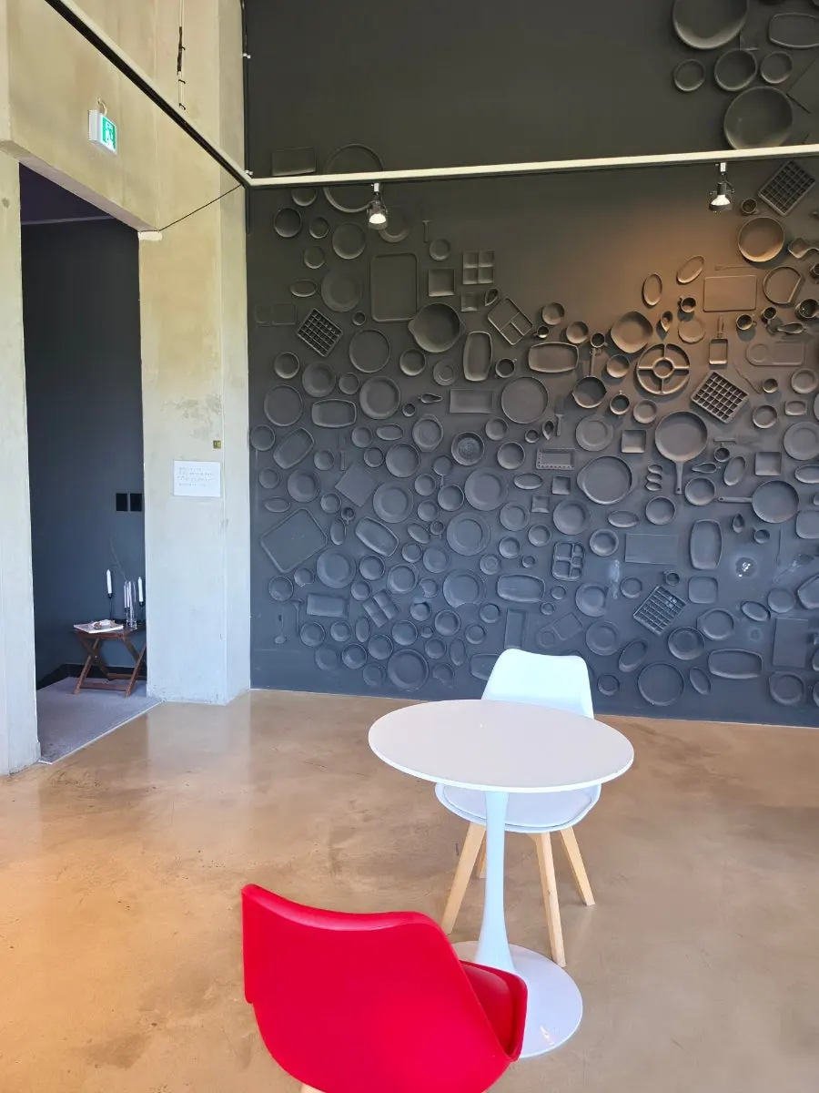 Bean bag sofas and floor-to-ceiling window view on Yard's 2nd floor