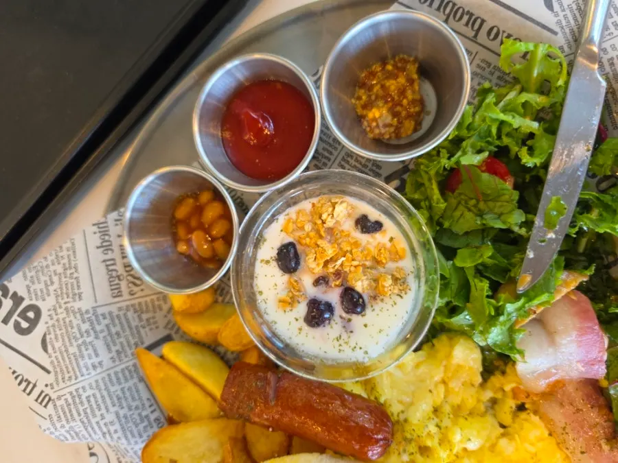 Yard's signature brunch with scrambled eggs and salad