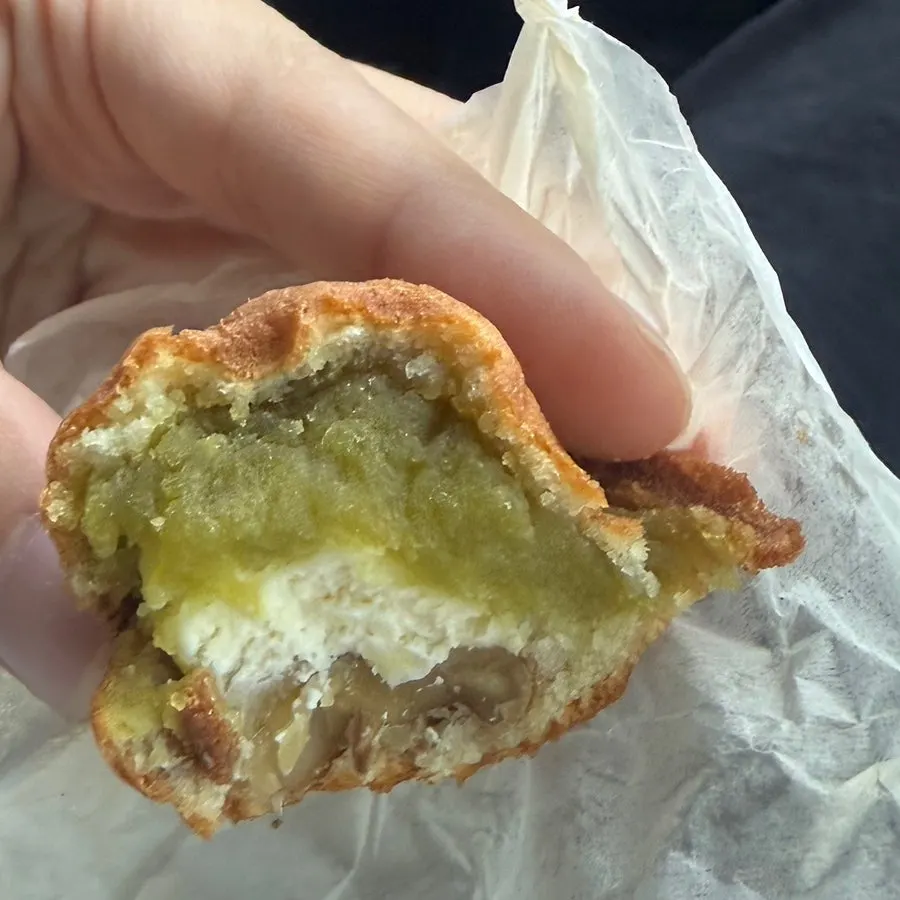Pea paste and cream cheese filling inside a walnut pastry
