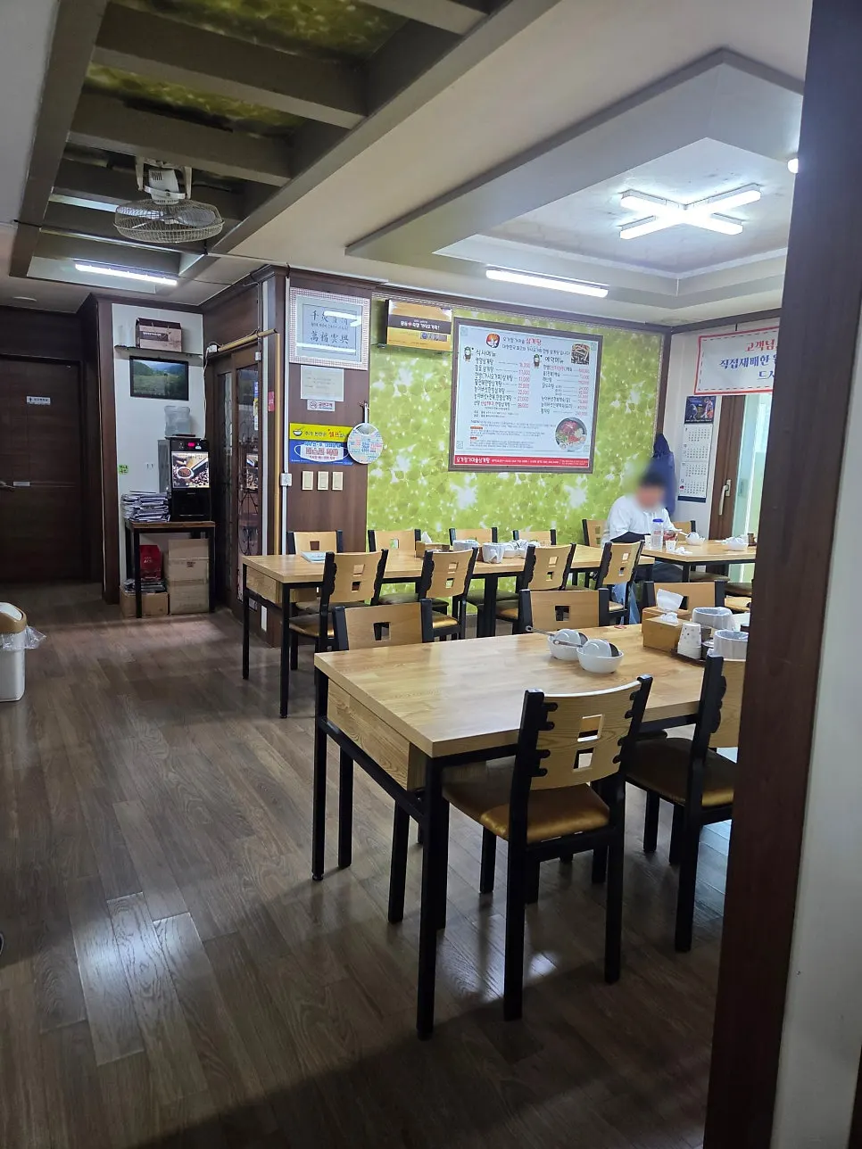 Interior of the restaurant with hall seating and a private room