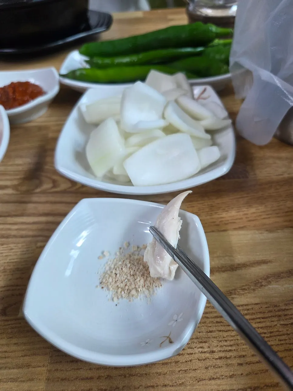 Samgyetang chicken dipped in salt