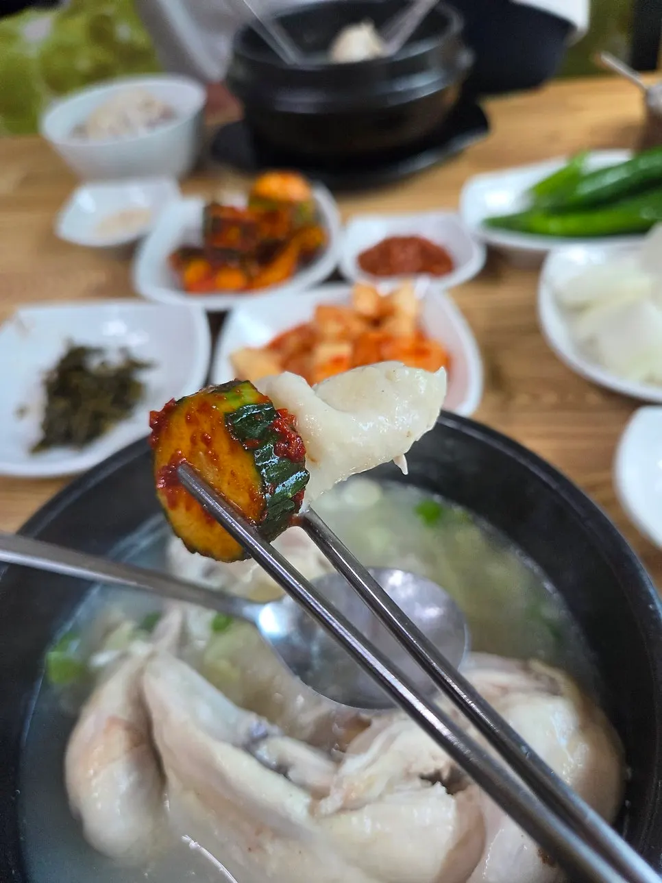 Samgyetang chicken eaten together with cucumber kimchi