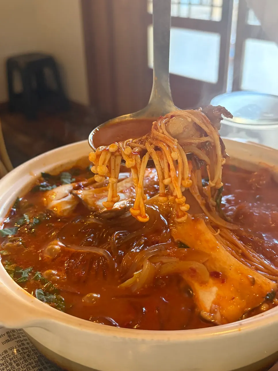 Pot of Korean beef tripe hot pot on a burner