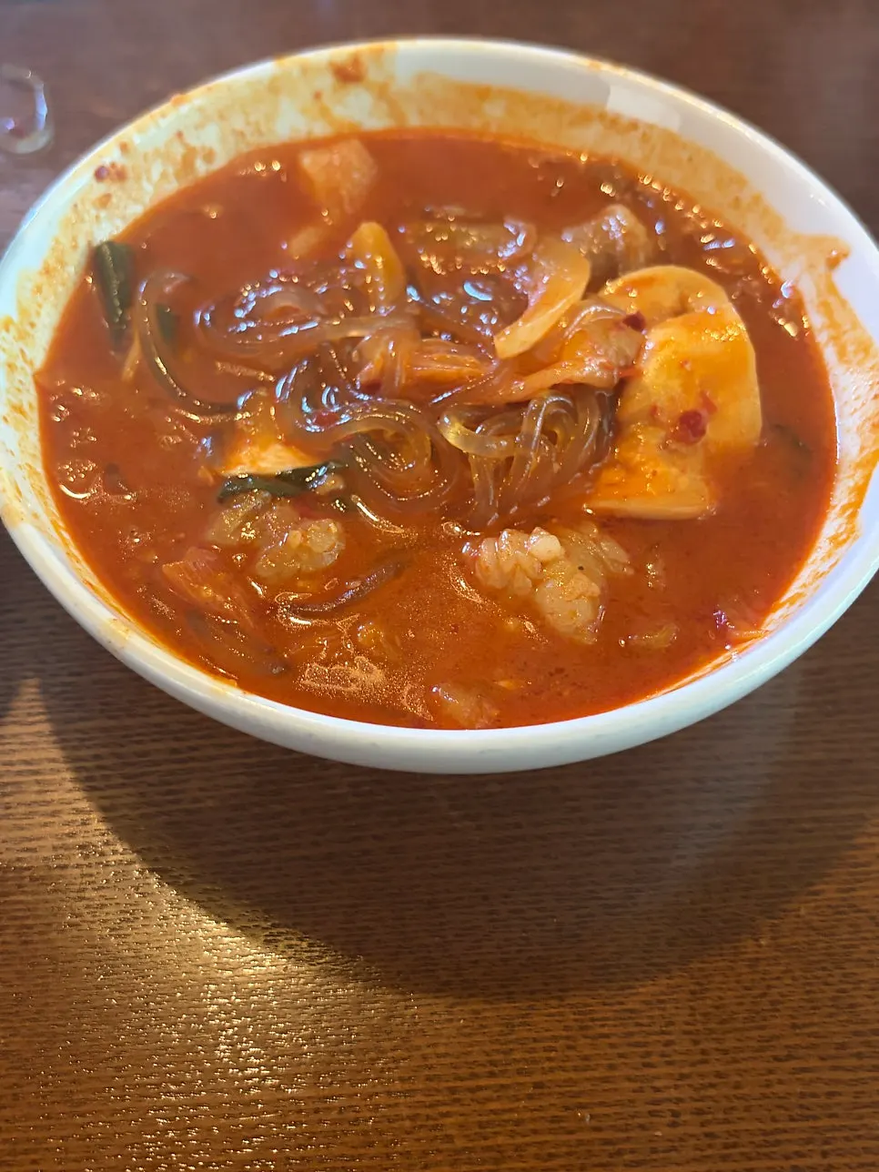A meal of egg rice with Korean beef tripe hot pot