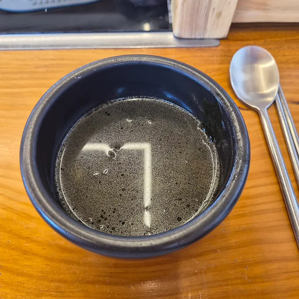Seaweed soup served with the grilled fish set