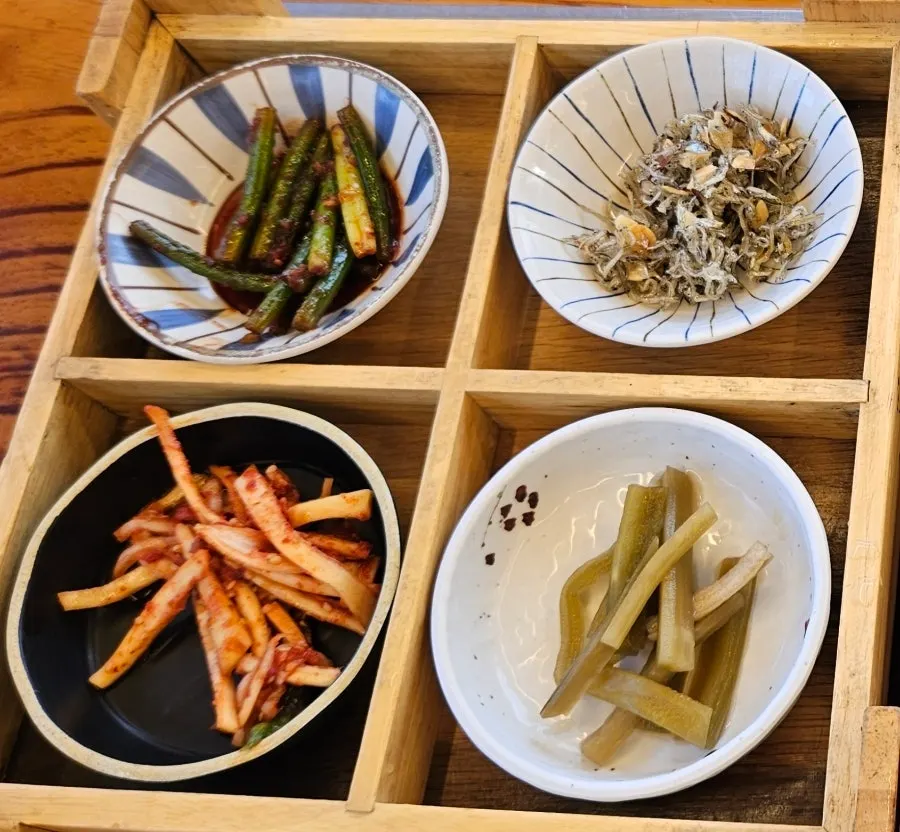 A neatly arranged spread of Korean side dishes