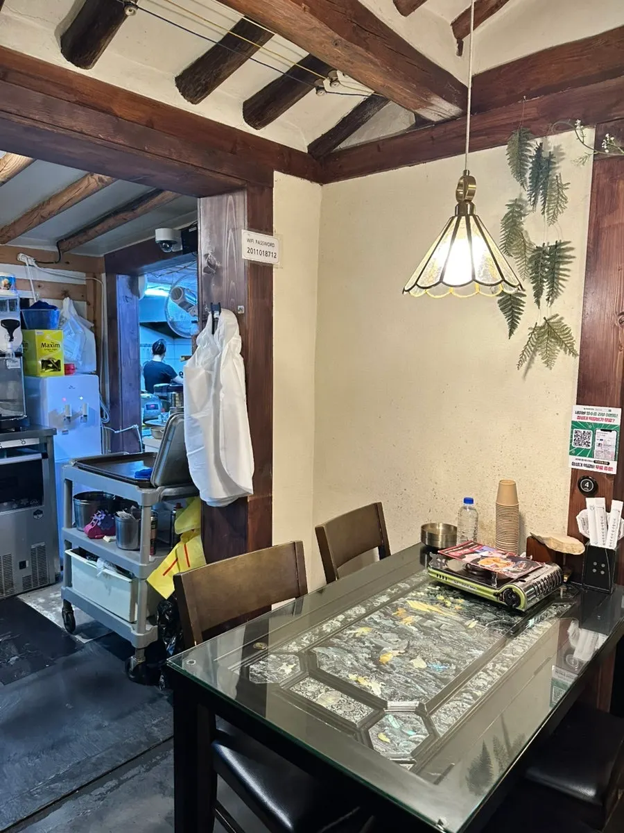 Window-side dining table with a hanok view