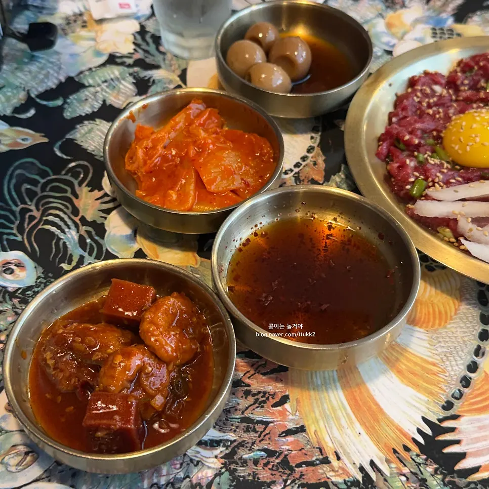 Bibimbap and set menu board at Hwangnam Dukkebi