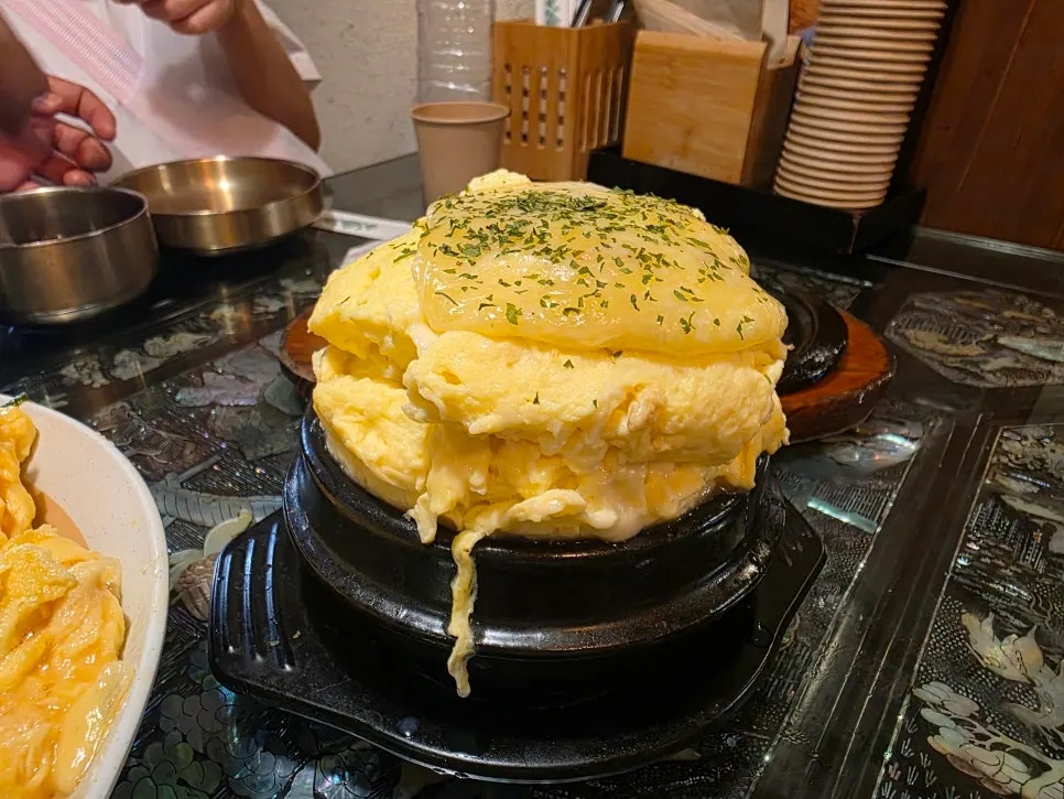Puffed-up cheese royal-tomb steamed egg