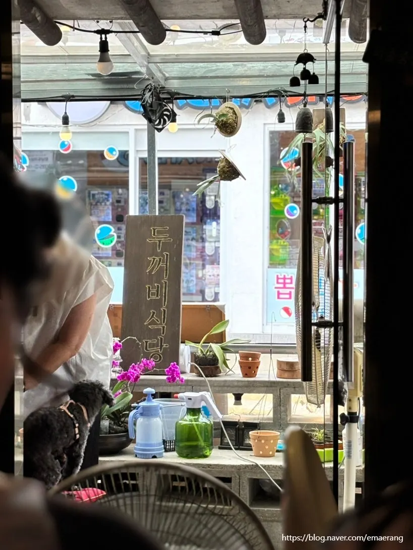 Cozy seated tables at Hwangnam Dukkebi Restaurant