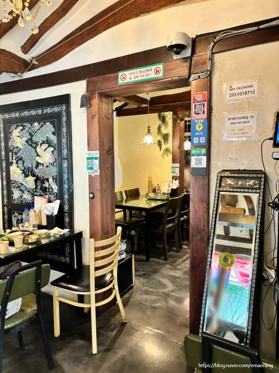 The long interior hall of Hwangnam Dukkebi Restaurant