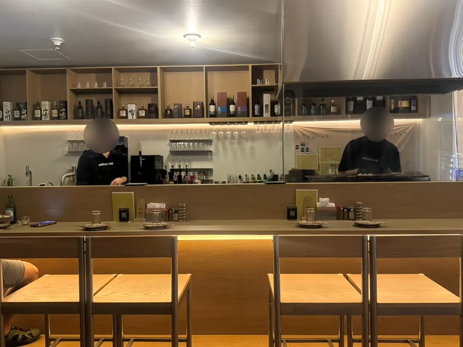Open kitchen and counter seating inside Yakitori Sogi