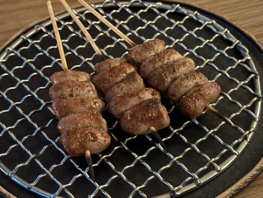 First skewer served, chicken tenderloin yakitori