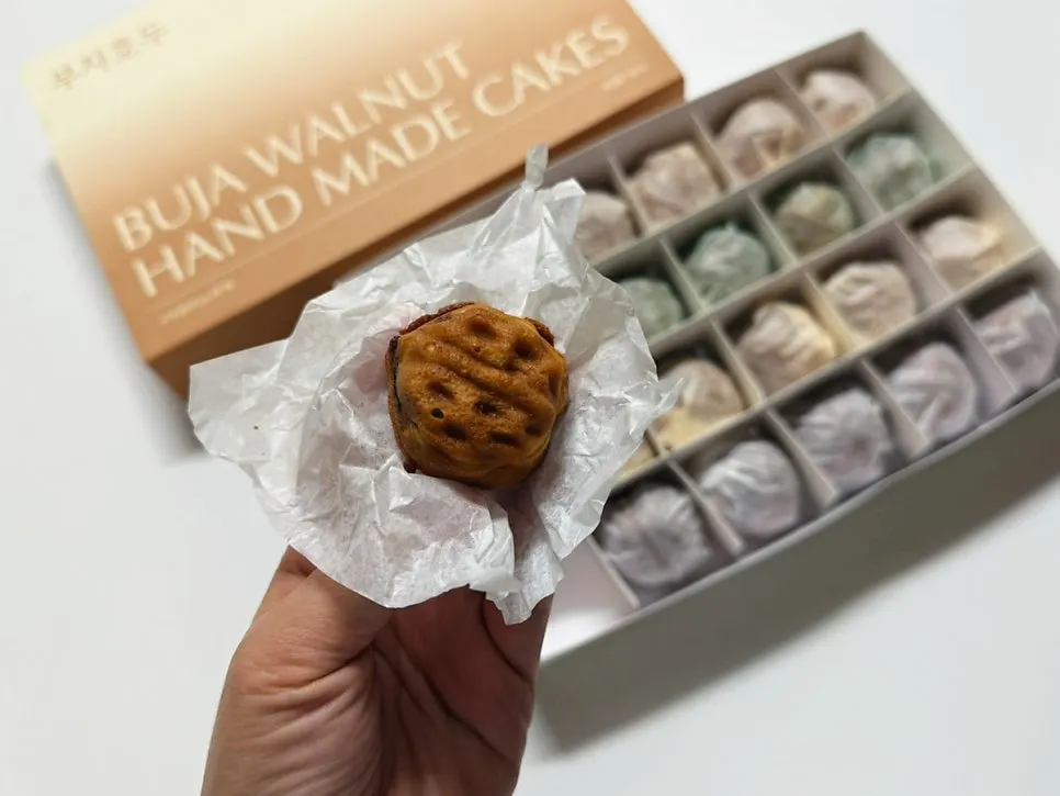 Cross-section of a red bean walnut pastry with a whole walnut inside