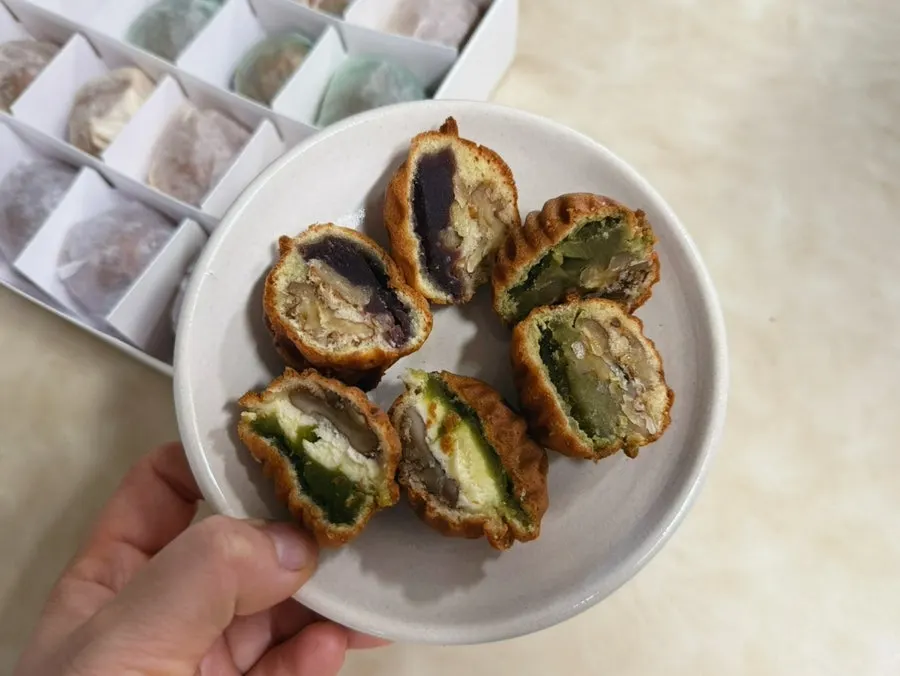 Three flavors of walnut pastry lined up together