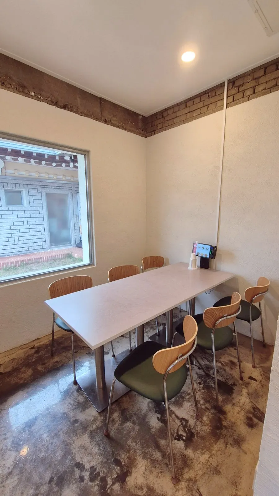 Private dining space separated into a room