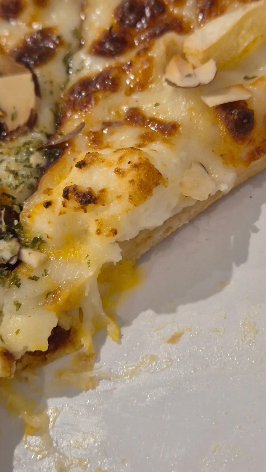 Quattro cheese pizza piled with cheese
