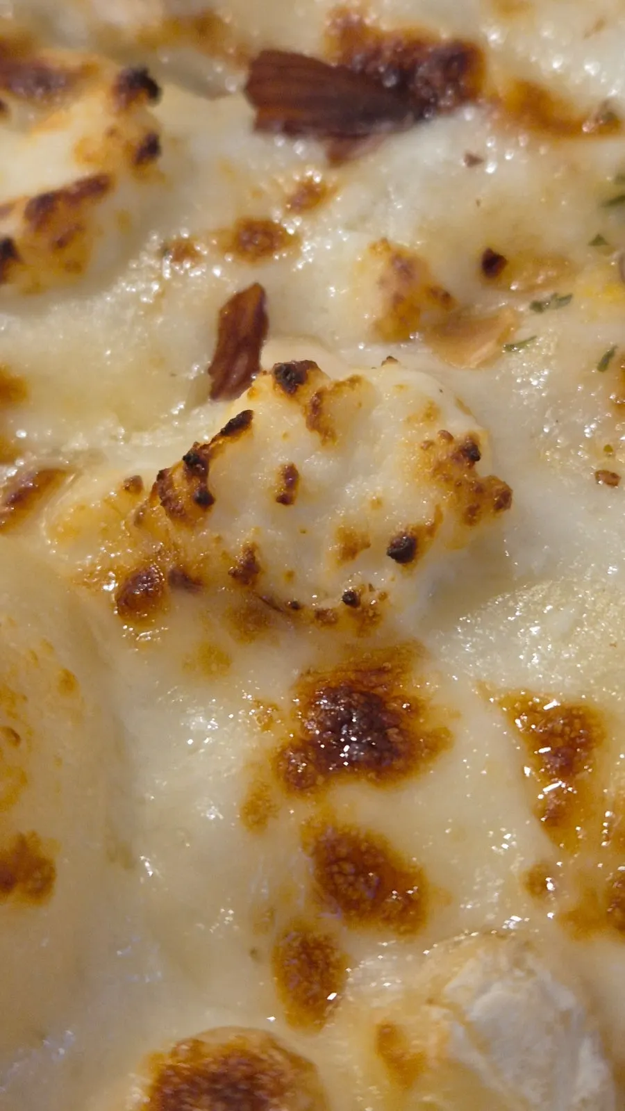 Quattro cheese pizza served with honey