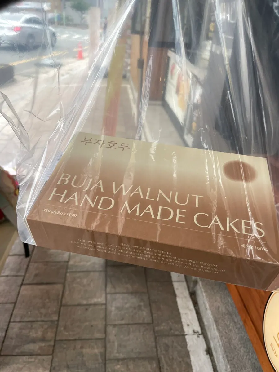 Freshly made walnut pastries packaged after waiting in line
