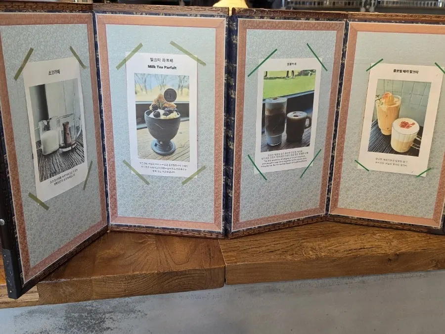 Cafe Bonghwangdang drink menu board
