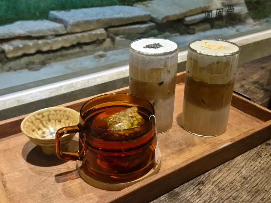 Lattes and chamomile tea on the table