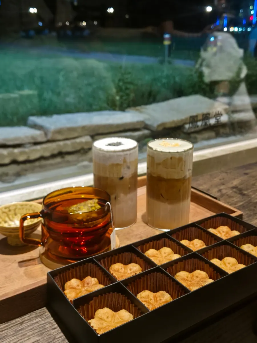 Drinks and yeonhwagwa set on a window-side table